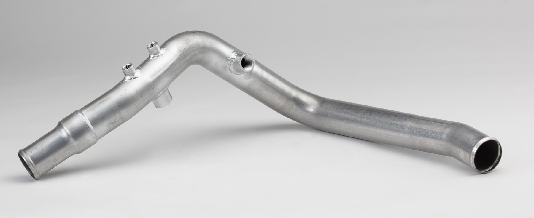 Charge air cooling tubes with 1D bends for turbocharged engine systems