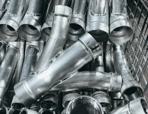 Custom fabricated industrial vacuum tubing configurations and assemblies