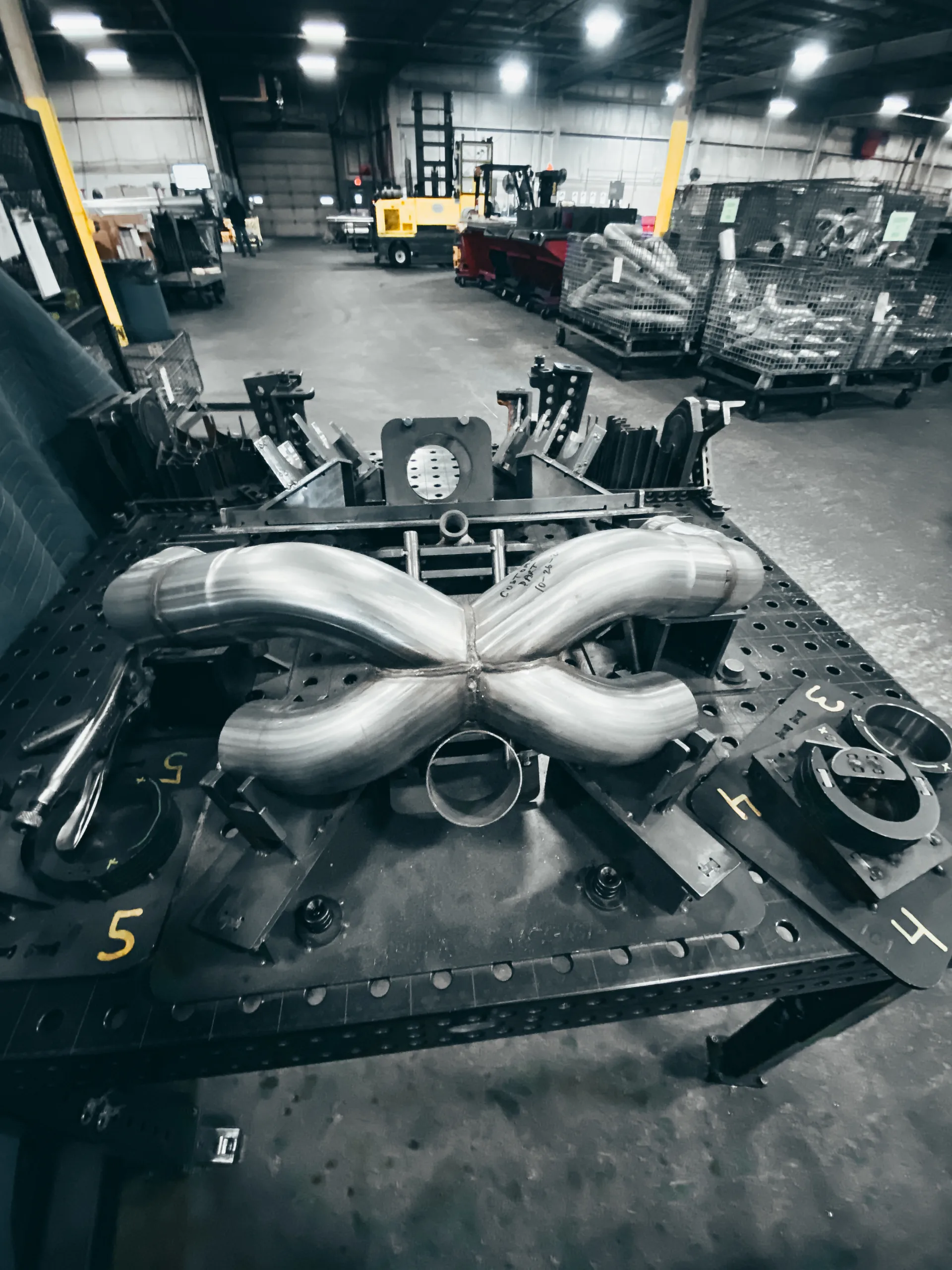 Stainless steel X-pipe crossover assembly for aftermarket exhaust applications